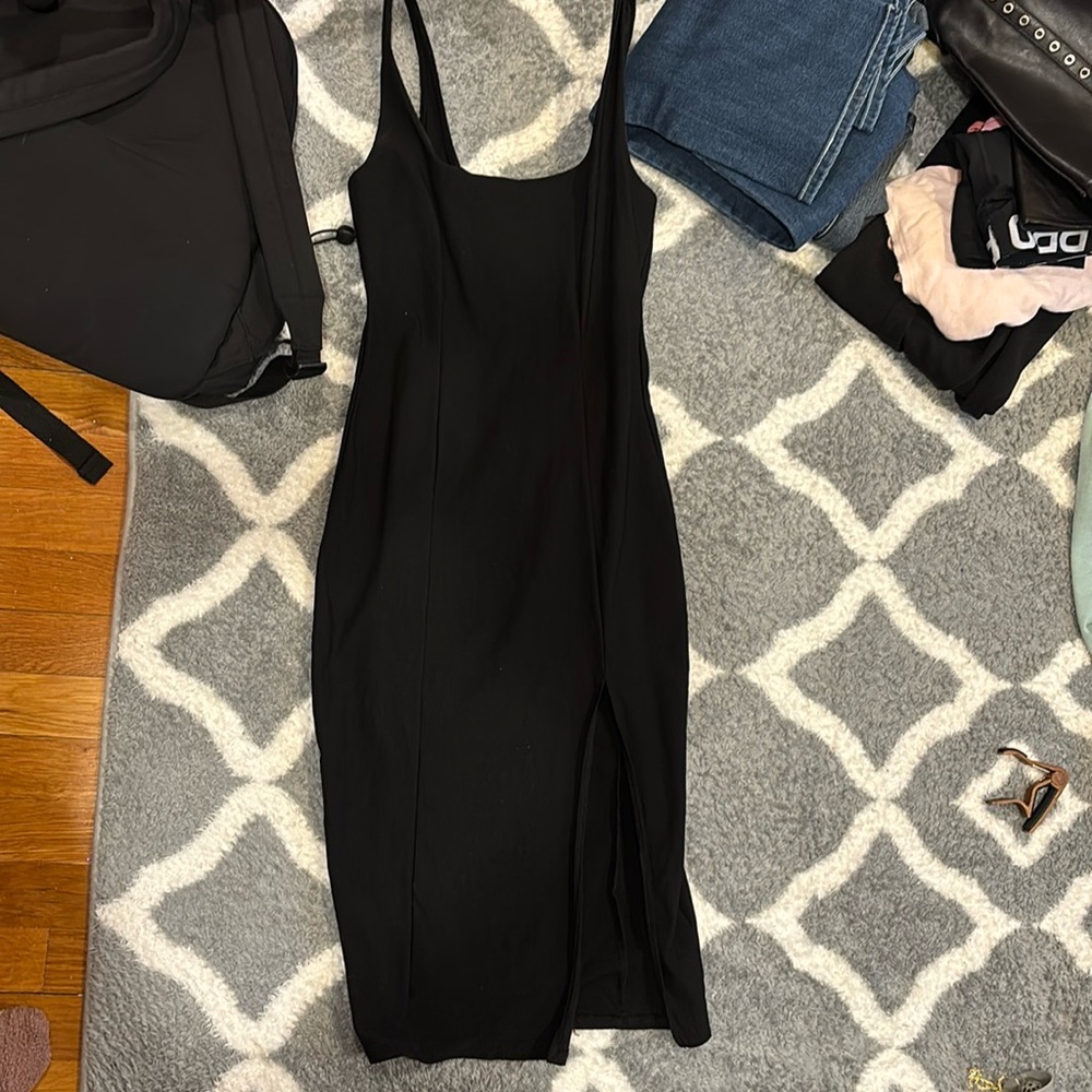 black dress, good for going out, never worn